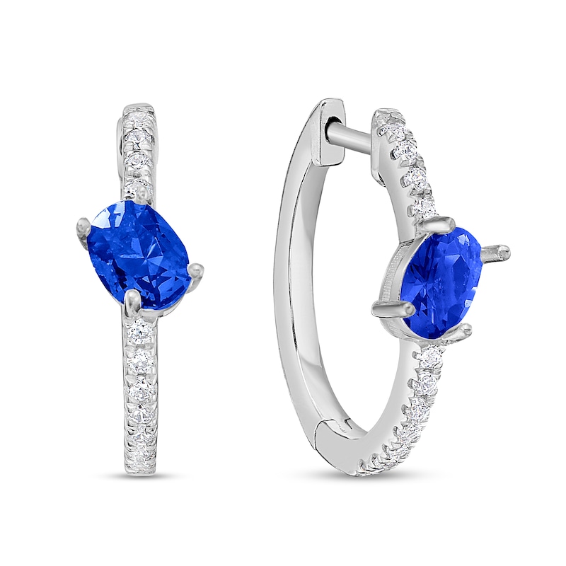 Main Image 1 of Tilted Oval Blue Sapphire and 1/5 CT. T.W. Diamond Hoop Earrings in 10K White Gold