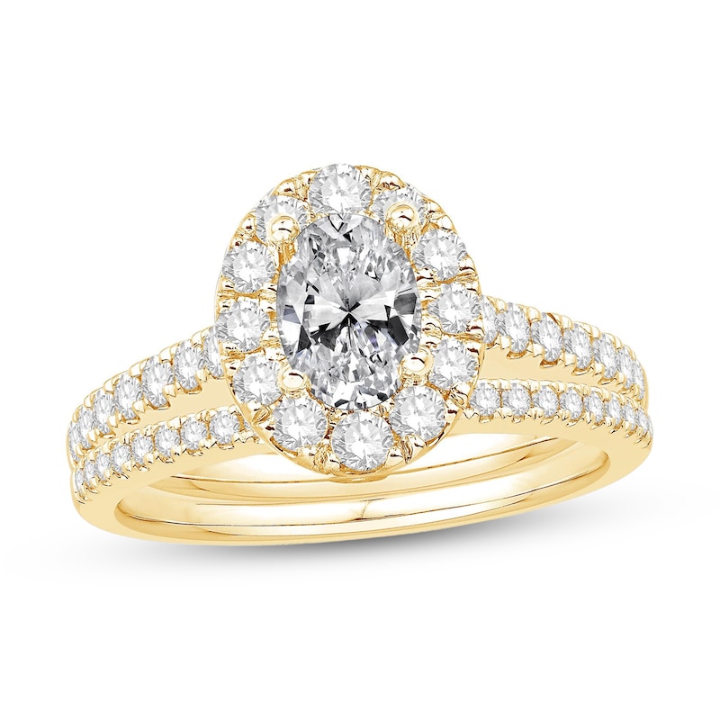 Main Image 1 of Celebration Ideal 1-1/2 CT. T.W. Oval Certified Diamond Frame Split Shank Bridal Set in 14K Gold (I/I1)