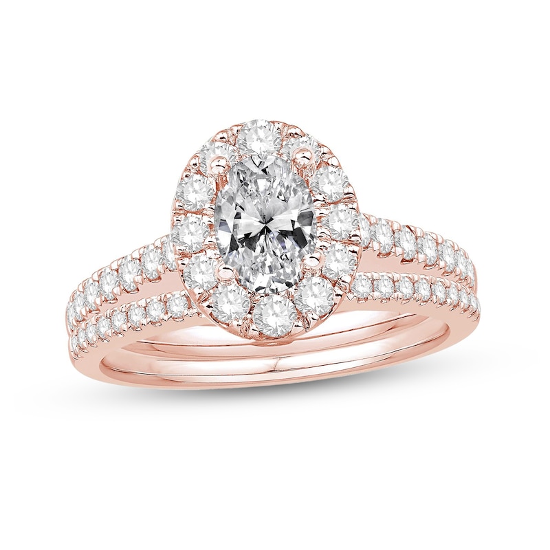 Main Image 1 of Celebration Ideal 1-1/2 CT. T.W. Oval Certified Diamond Frame Split Shank Bridal Set in 14K Rose Gold (I/I1)