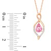 Thumbnail Image 2 of Pear-Shaped Garnet and 1/20 CT. T.W. Diamond Loop Pendant in 10K Rose Gold