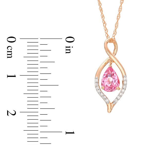 Pear-Shaped Garnet and 1/20 CT. T.w. Diamond Loop Pendant in 10K Rose Gold