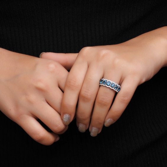 4.0mm London Blue Topaz and White Lab-Created Zircon Scallop Border Seven Stone Ring in Sterling Silver