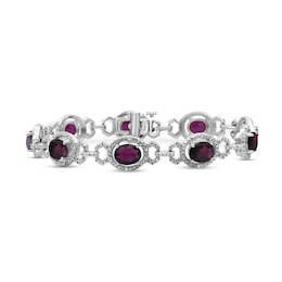 Oval Garnet and 1/20 CT. T.W. Diamond Beaded Buckle-Style Line Bracelet in Sterling Silver - 7.5"