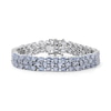 Thumbnail Image 1 of Sideways Oval Sky Blue Topaz Triple Row Line Bracelet in Sterling Silver - 7.5"