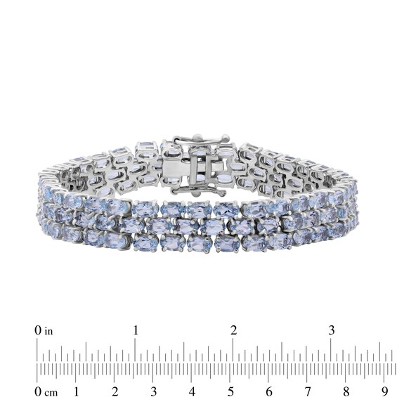 Sideways Oval Sky Blue Topaz Triple Row Line Bracelet in Sterling Silver - 7.5"
