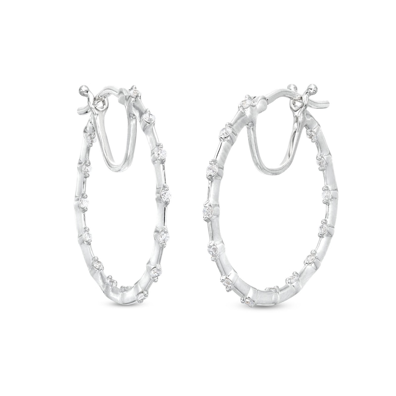 Main Image 1 of 1/4 CT. T.W. Diamond Station Inside-Out Hoop Earrings in 10K White Gold