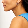 Thumbnail Image 2 of 1/4 CT. T.W. Diamond Station Inside-Out Hoop Earrings in 10K White Gold