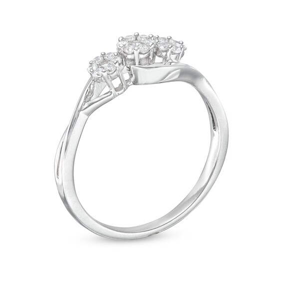 1/5 CT. T.w. Multi-Diamond Three Stone Twist Shank Ring in 10K White Gold