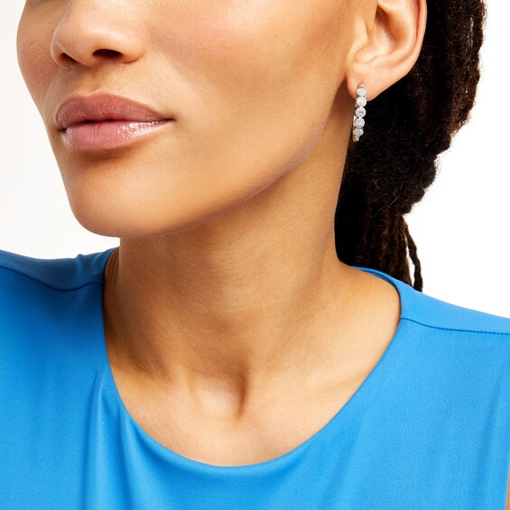 1/2 CT. T.w. Multi-Diamond Five Stone Hoop Earrings in 10K White Gold