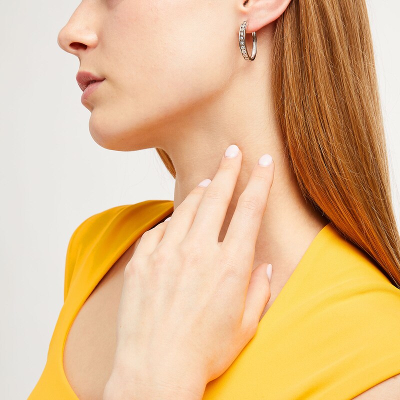 Main Image 2 of 1/4 CT. T.W. Diamond Oval Hoop Earrings in Sterling Silver