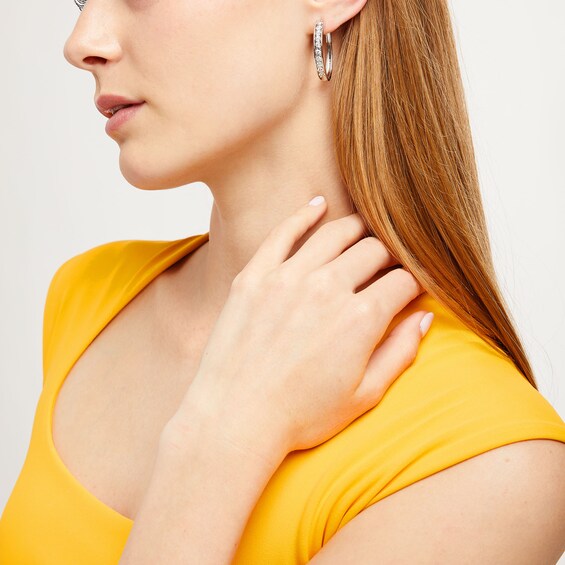 1/2 CT. T.w. Diamond Oval Hoop Earrings in Sterling Silver