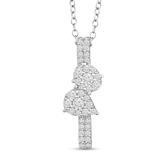 1/2 CT. T.w. Multi-Diamond Oval and Pear Linear Ribbon Pendant in 10K White Gold