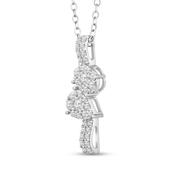 1/2 CT. T.w. Multi-Diamond Oval and Pear Linear Ribbon Pendant in 10K White Gold