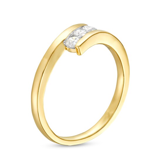1/3 CT. T.w. Diamond Slant Three Stone Bypass Ring in 10K Gold