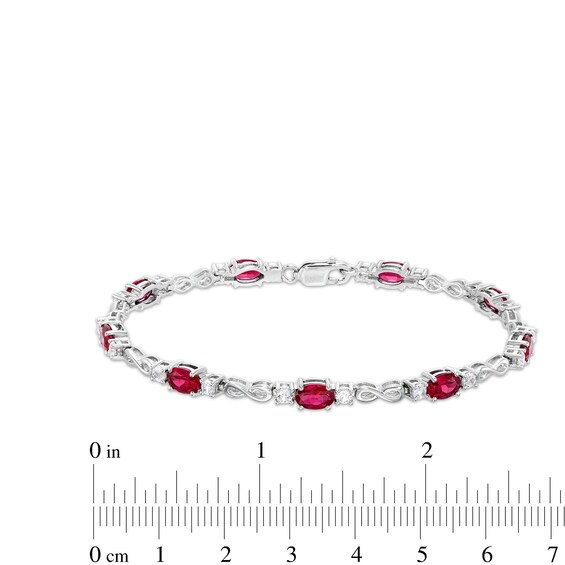 Oval Lab-Created Ruby and White Lab-Created Sapphire Alternating Infinity Line Bracelet in Sterling Silver - 7.25"