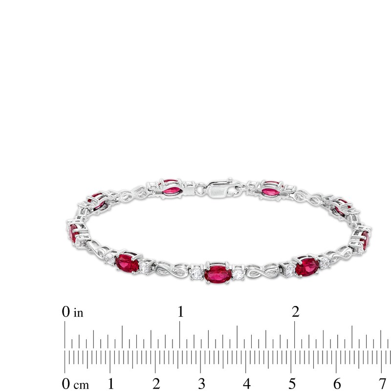 Main Image 4 of Oval Lab-Created Ruby and White Lab-Created Sapphire Alternating Infinity Line Bracelet in Sterling Silver - 7.25&quot;