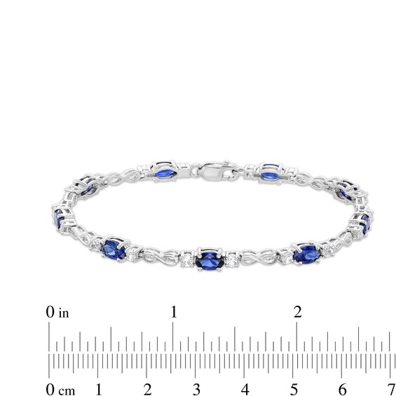 Oval Blue and White Lab-Created Sapphire Alternating Infinity Line Bracelet in Sterling Silver - 7.25"