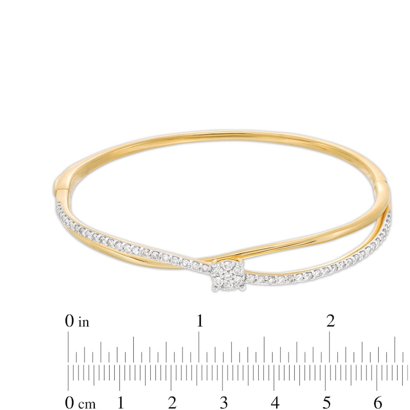 1 CT. T.W. Multi-Diamond Orbit Bangle in 10K Gold - 7.11"