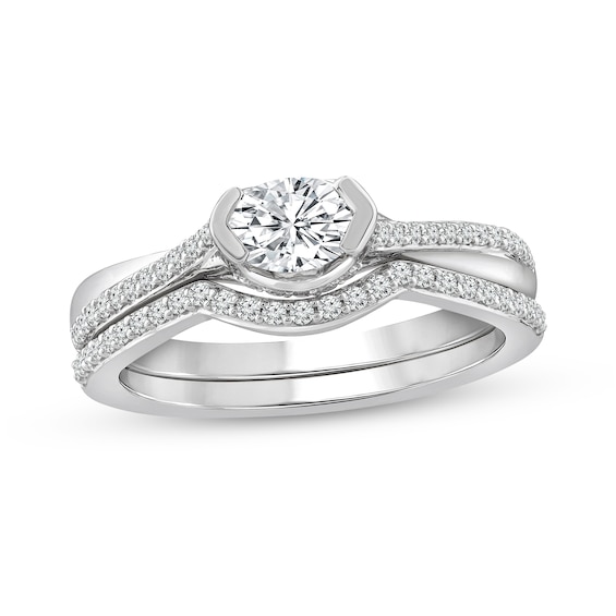 3/4 CT. T.w. Oval Diamond Sideways Bridal Set in 10K White Gold
