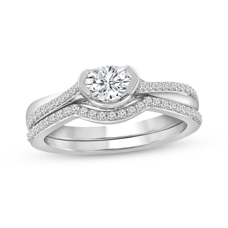 Main Image 1 of 3/4 CT. T.W. Oval Diamond Sideways Bridal Set in 10K White Gold
