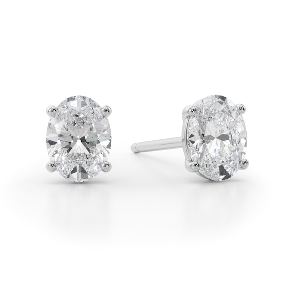 1/2 CT. T.w. Oval Diamond Solitaire Stud Earrings in 14K White Gold (I/Si2)