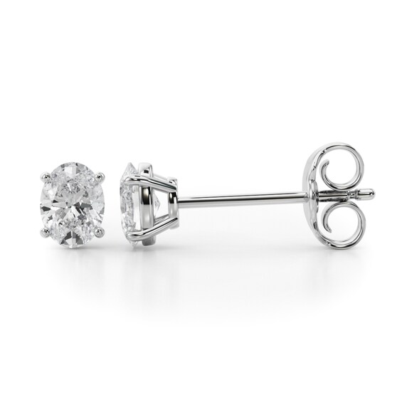 1/2 CT. T.w. Oval Diamond Solitaire Stud Earrings in 14K White Gold (I/Si2)
