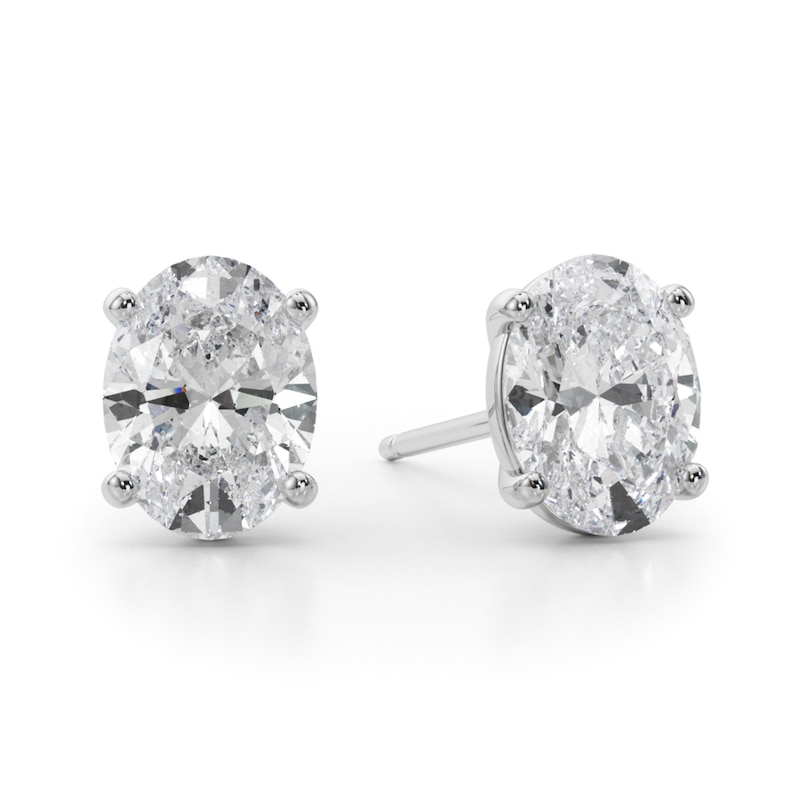 Main Image 1 of 1 CT. T.W. Oval Diamond Solitaire Stud Earrings in 14K White Gold (I/SI2)