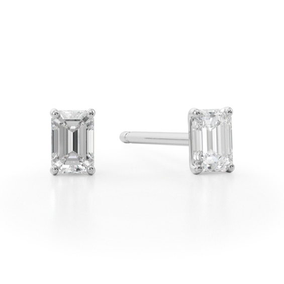 1/ CT. T.w. Emerald-Cut Diamond Solitaire Stud Earrings in 14K White Gold (I/Si2