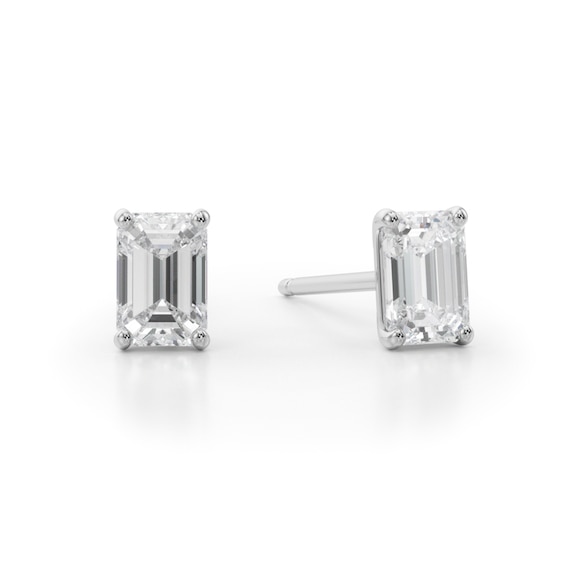 1/ CT. T.w. Emerald-Cut Diamond Solitaire Stud Earrings in 14K White Gold (I/Si2