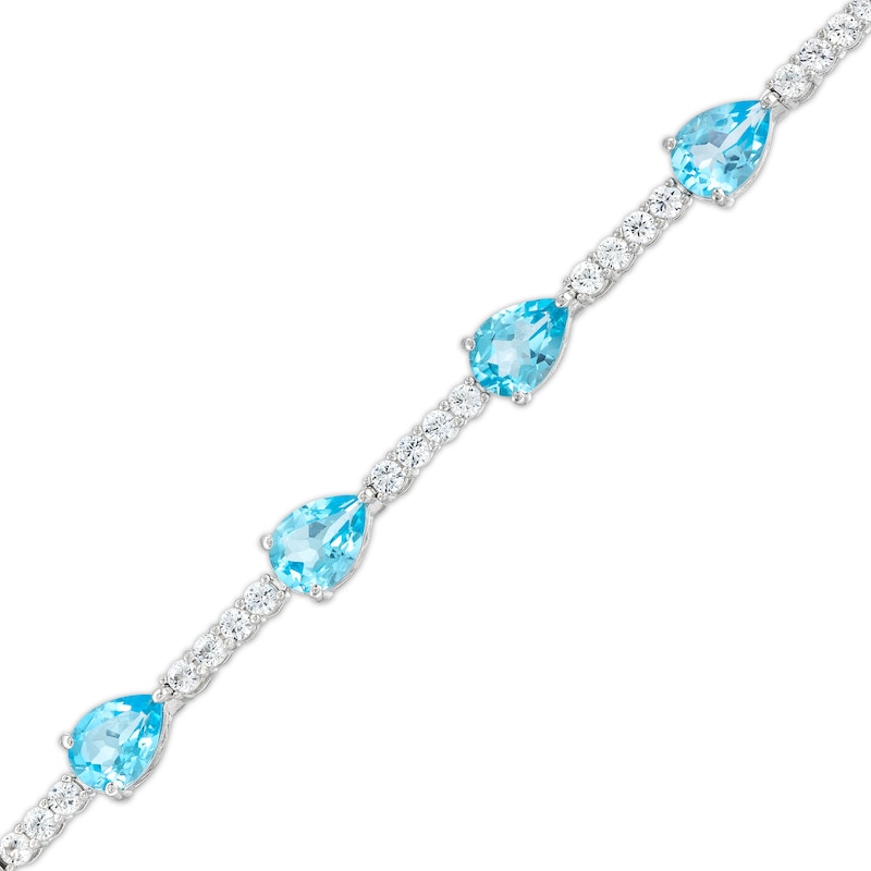 Pear-Shaped Swiss Blue Topaz and White Lab-Created Sapphire Station Line Bracelet in Sterling Silver - 7.25"