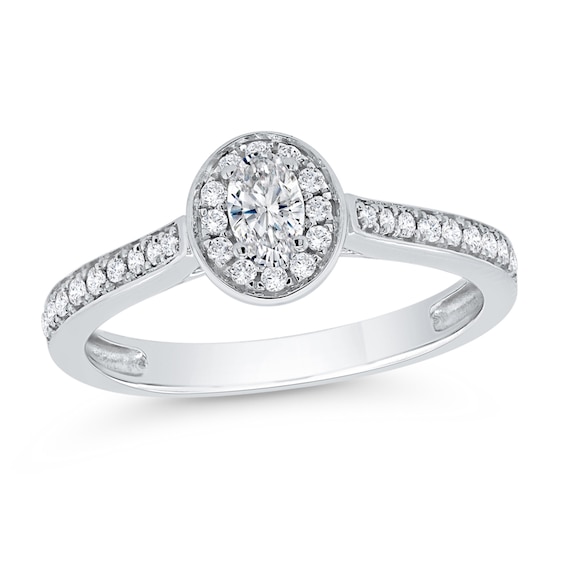1/5 CT. T.w. Oval Diamond Frame Promise Ring in 10K White Gold