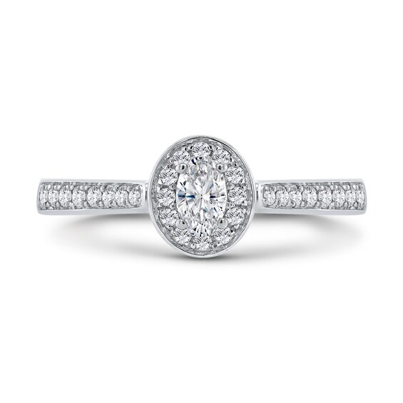 1/5 CT. T.w. Oval Diamond Frame Promise Ring in 10K White Gold