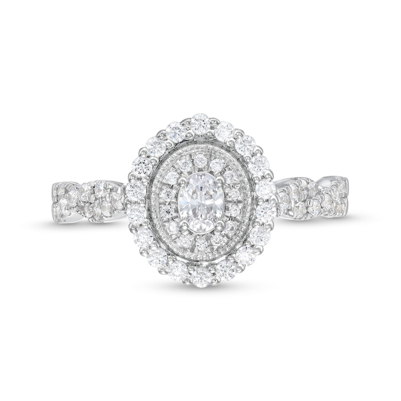 Main Image 4 of 5/8 CT. T.W. Oval Diamond Vintage-Style Frame Twist Shank Engagement Ring in 10K White Gold