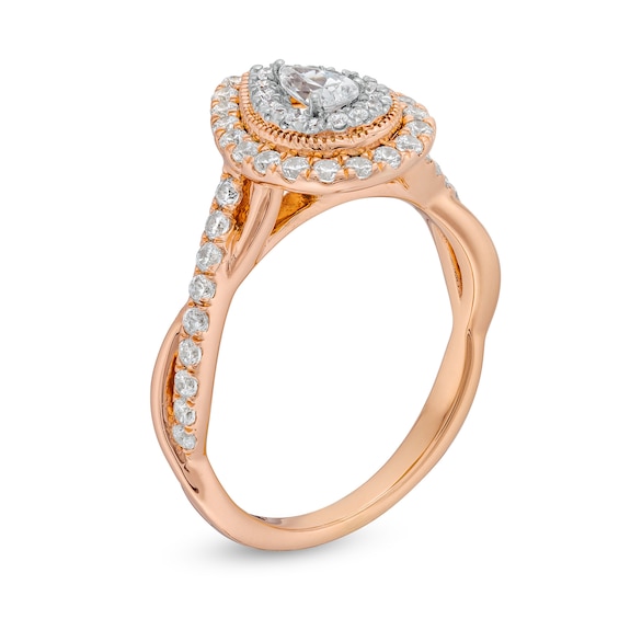 3/4 CT. T.w. Pear-Shaped Diamond Double Frame Twist Shank Engagement Ring in 10K Rose Gold