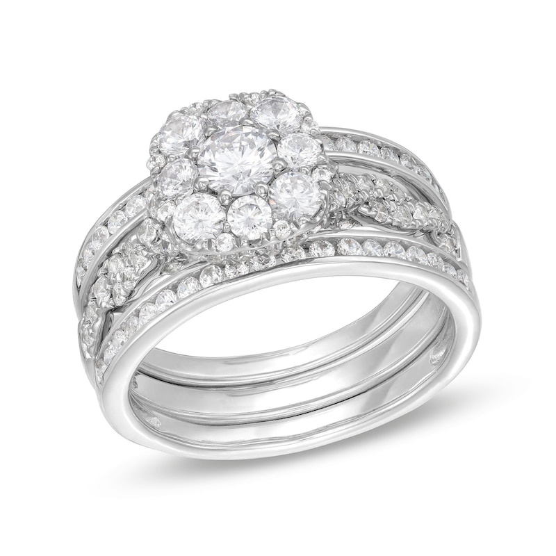 Main Image 1 of 1-1/2 CT. T.W. Cushion Multi-Diamond Twist Shank Three Piece Bridal Set in 10K White Gold