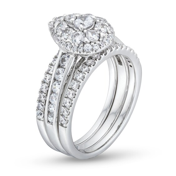 1-1/4 CT. T.w. Pear Multi-Diamond Three Piece Bridal Set in 10K White Gold