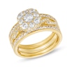 Thumbnail Image 1 of 1-1/2 CT. T.W. Cushion Multi-Diamond Twist Shank Three Piece Bridal Set in 10K Gold
