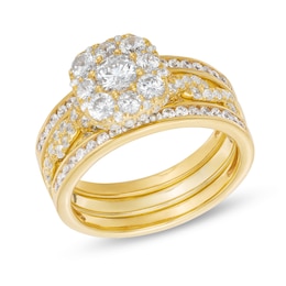 1-1/2 CT. T.W. Cushion Multi-Diamond Twist Shank Three Piece Bridal Set in 10K Gold