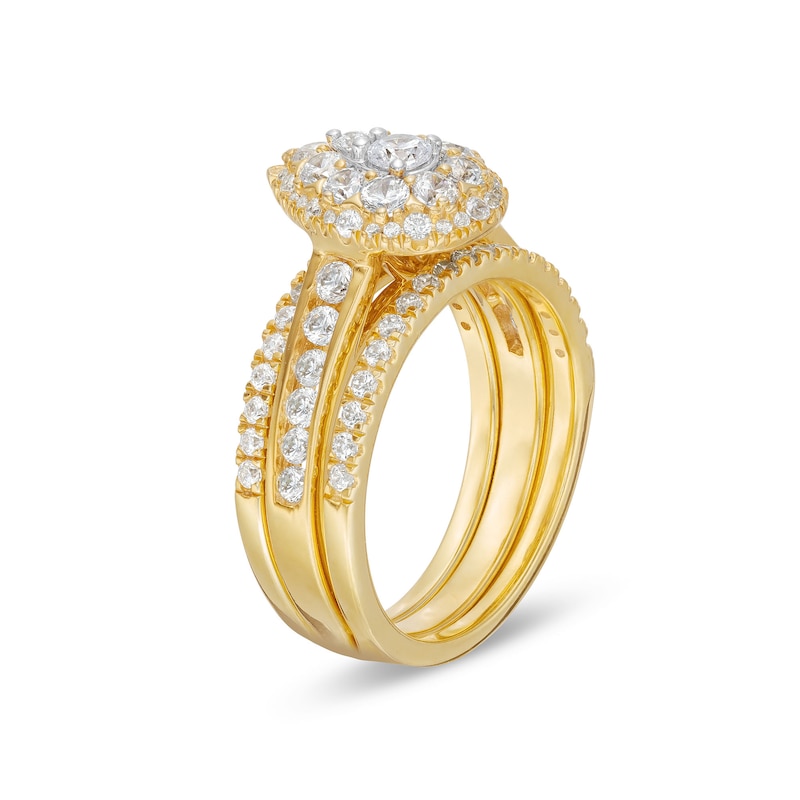 Main Image 4 of 1-1/4 CT. T.W. Pear Multi-Diamond Three Piece Bridal Set in 10K Gold