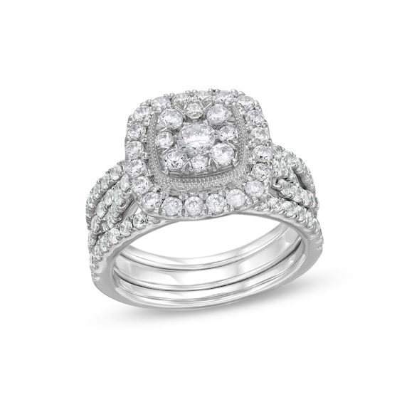 1-5/8 CT. T.w. Cushion Multi-Diamond Twist Shank Three Piece Bridal Set in 10K White Gold