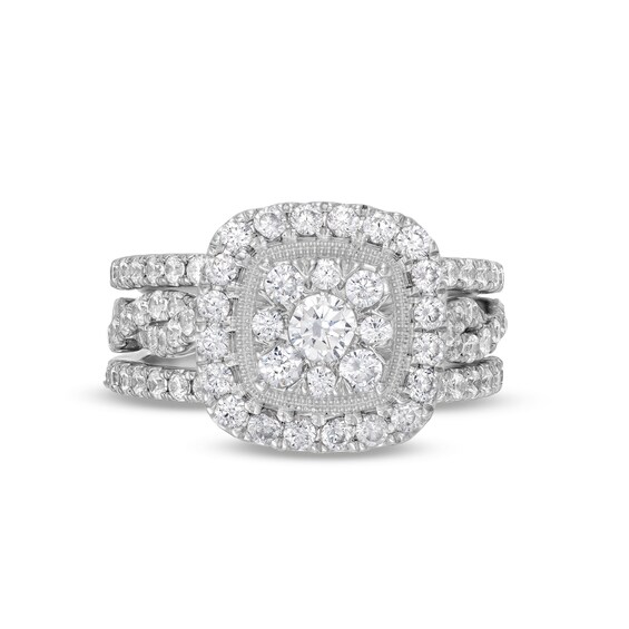 1-5/8 CT. T.w. Cushion Multi-Diamond Twist Shank Three Piece Bridal Set in 10K White Gold