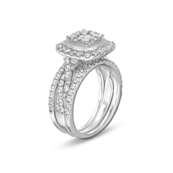 1-5/8 CT. T.w. Cushion Multi-Diamond Twist Shank Three Piece Bridal Set in 10K White Gold