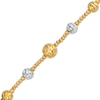 Thumbnail Image 0 of Oro Diamante™ Graduating Brilliance Bead Bracelet in Hollow 14K Two-Tone Gold - 7.5"