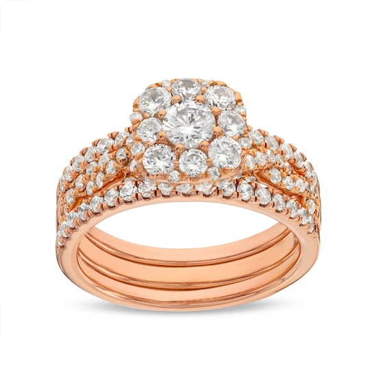 1-1/2 CT. T.w. Cushion Multi-Diamond Twist Shank Three Piece Bridal Set in 10K Rose Gold