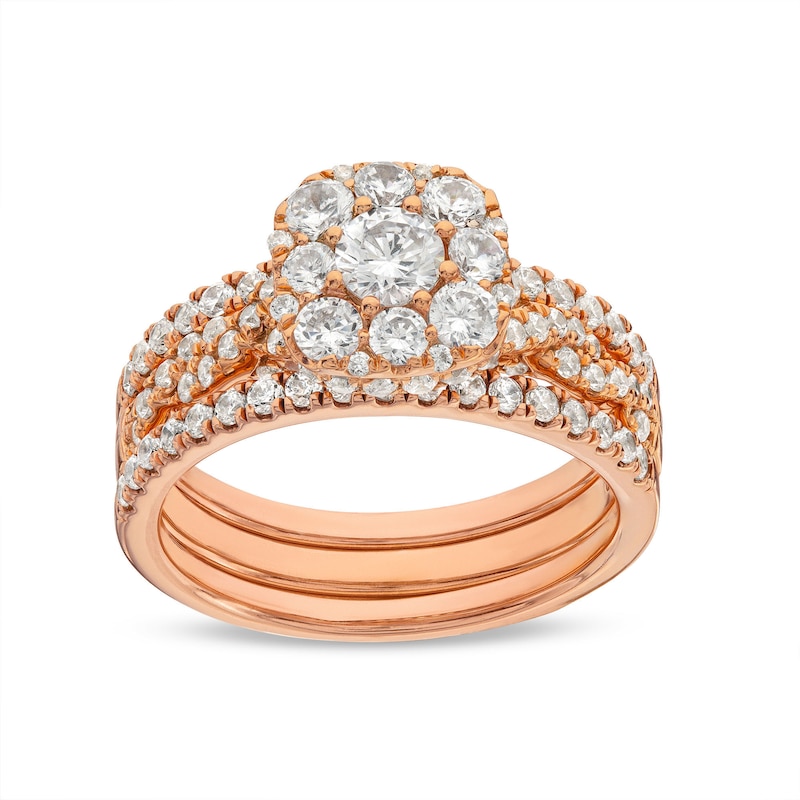 Main Image 1 of 1-1/2 CT. T.W. Cushion Multi-Diamond Twist Shank Three Piece Bridal Set in 10K Rose Gold