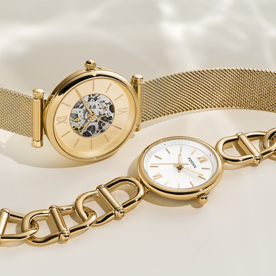Ladies' Fossil Carlie Automatic Gold-Tone Mesh Watch with Roman Numeral Gold-Tone Skeleton Sunray Dial (Model: Me3250)