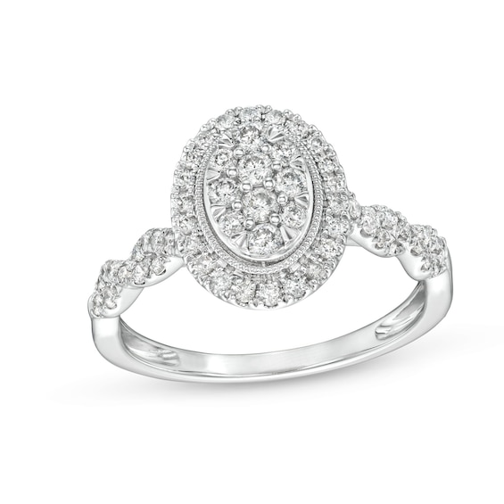 1/2 CT. T.w. Oval Multi-Diamond Frame Twist Shank Engagement Ring in 10K White Gold