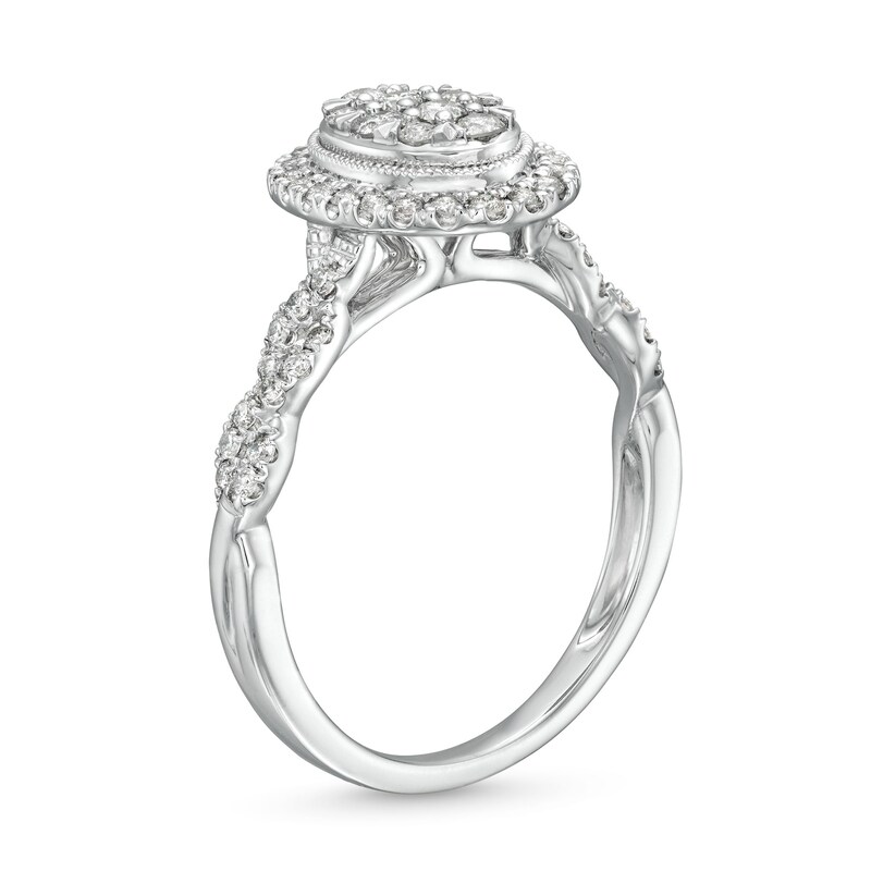 1/2 CT. T.W. Oval Multi-Diamond Frame Twist Shank Engagement Ring in 10K White Gold