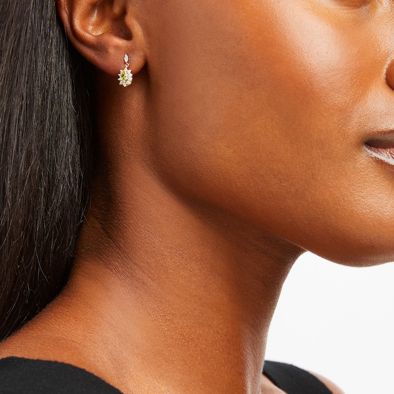 Main Image 2 of Oval Peridot and 1/4 CT. T.W. Diamond Sunburst Frame Dangle Drop Earrings in 10K Gold