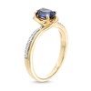 Thumbnail Image 3 of Oval Blue Lab-Created Sapphire and 1/10 CT. T.W. Diamond Bypass Ring in 10K Gold